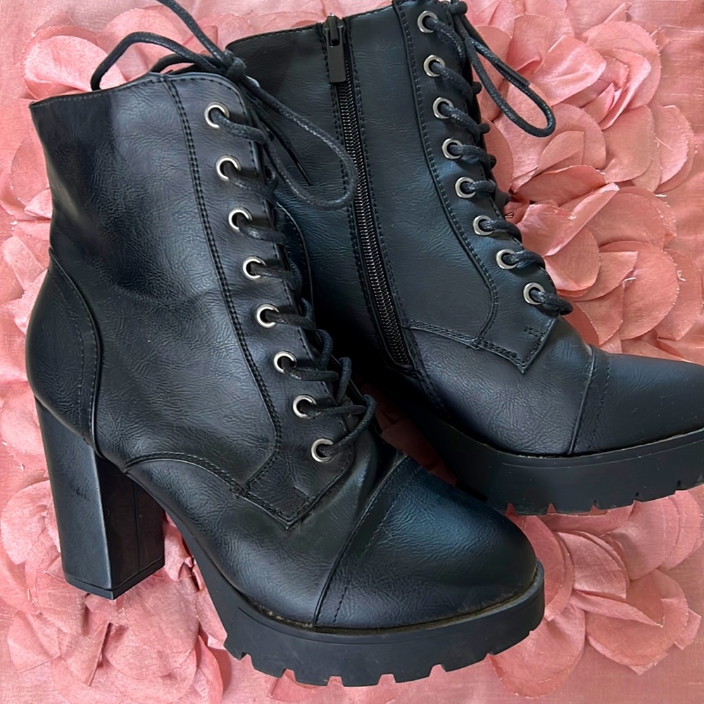 Black leather heeled ankle boots